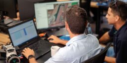 Users viewing crop management data in LP360 on computer screen